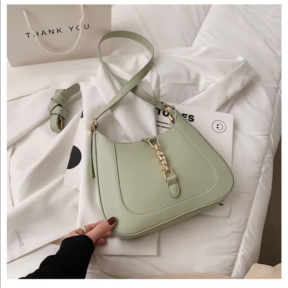 Crossbody shoulder purse with buckle design